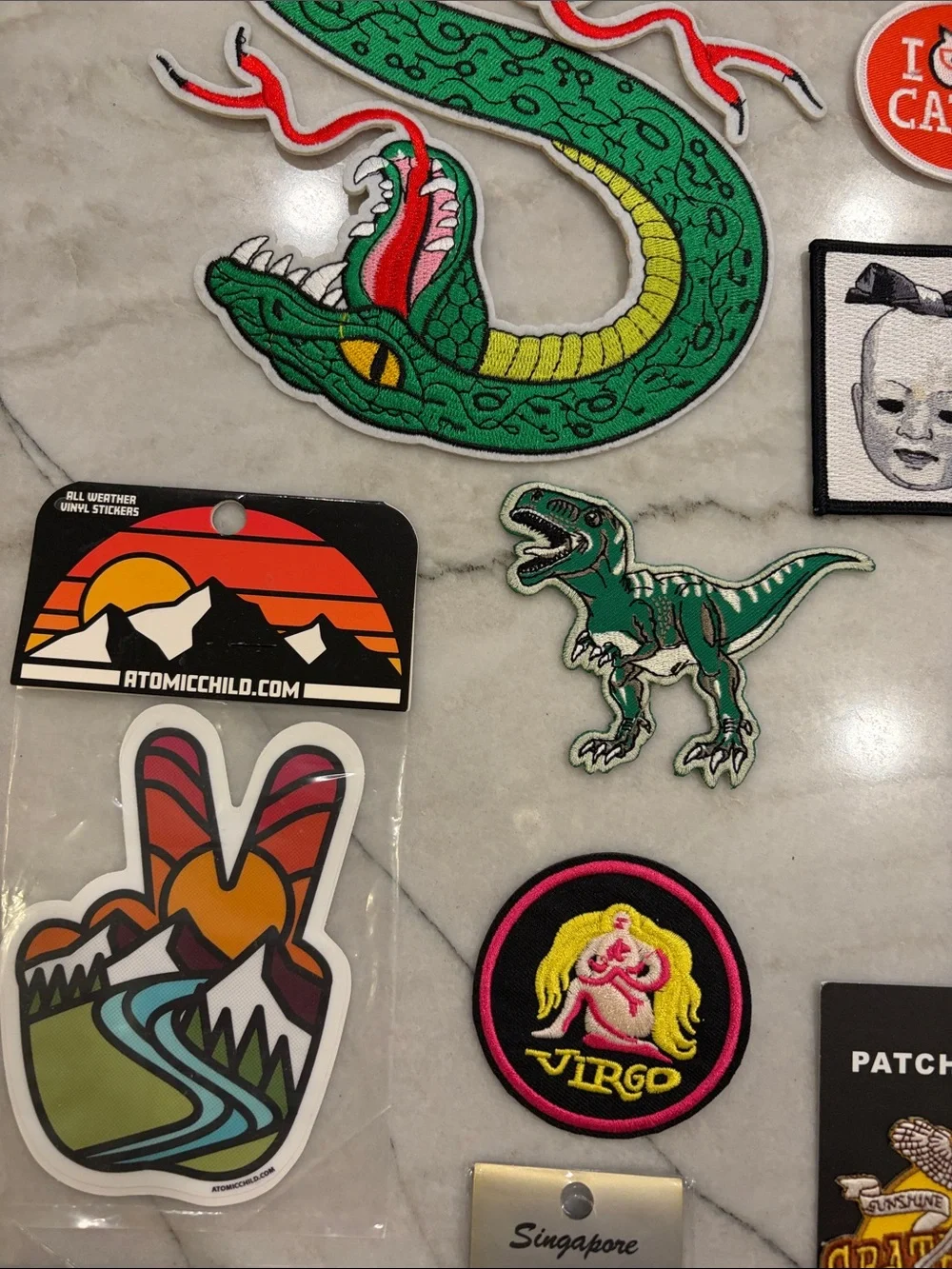 28 piece Assorted Iron-On Patches and Enamel Pins - Multi-Color Patch Collection